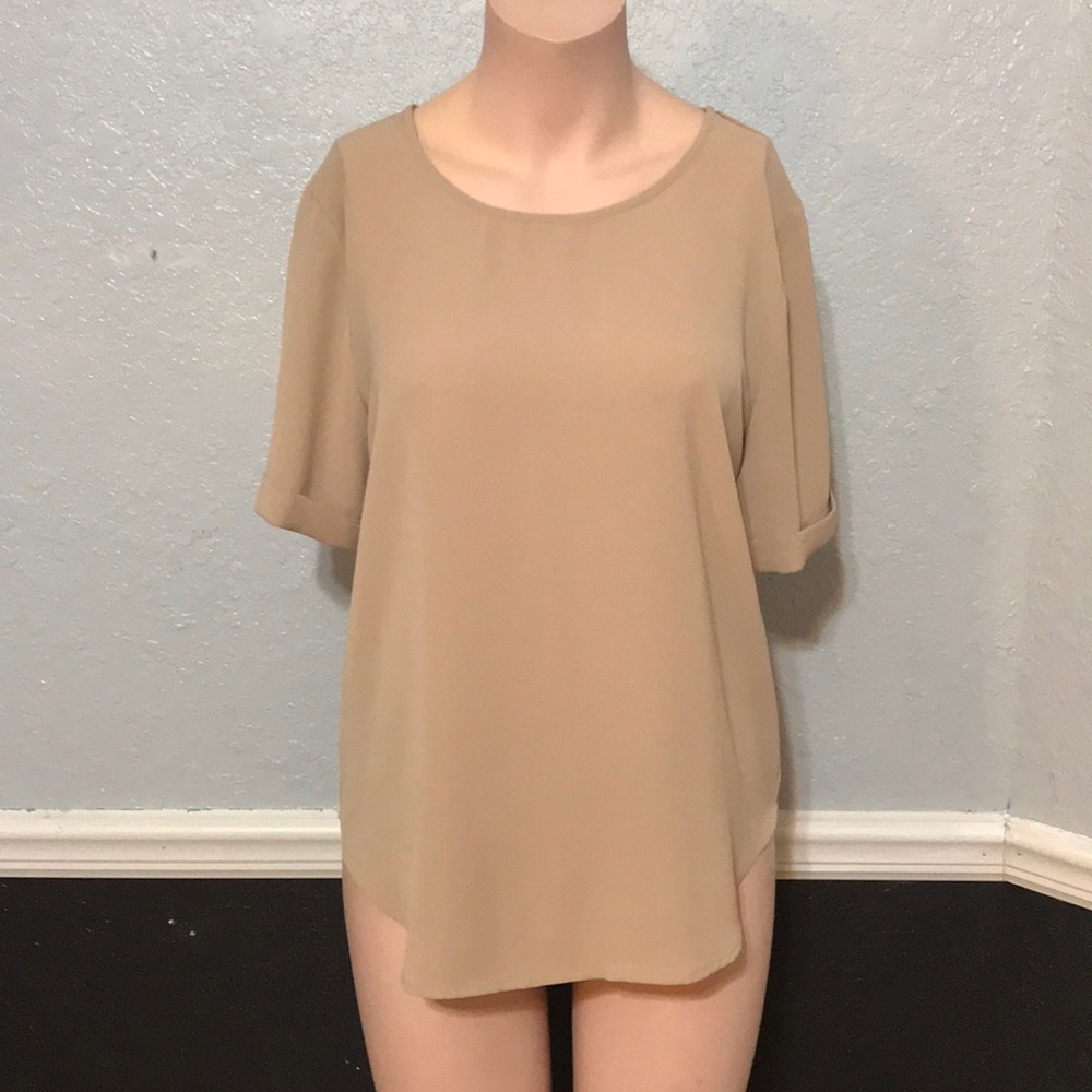 Tan mesh-like top.
